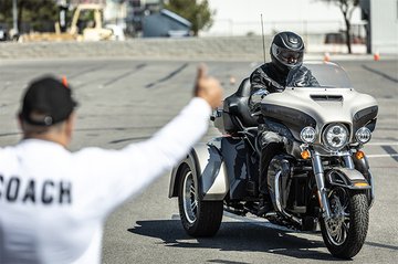 Person riding a trike on training range